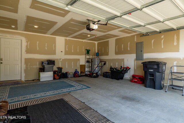 1423 Ridge Estates Dr, Athens, TN 37303 - garage with electric panel, water heater, and a garage door opener