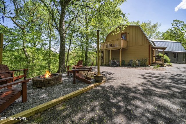 901 Sunrise Blvd, Sevierville, TN 37862 - exterior space featuring metal roof and an outdoor fire pit