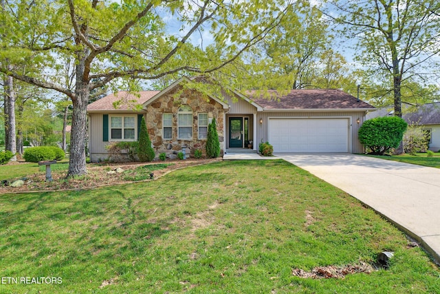 11 Windsor Pt, Crossville, TN 38558 - ranch-style house featuring concrete driveway, an attached garage, stone siding, and a front lawn
