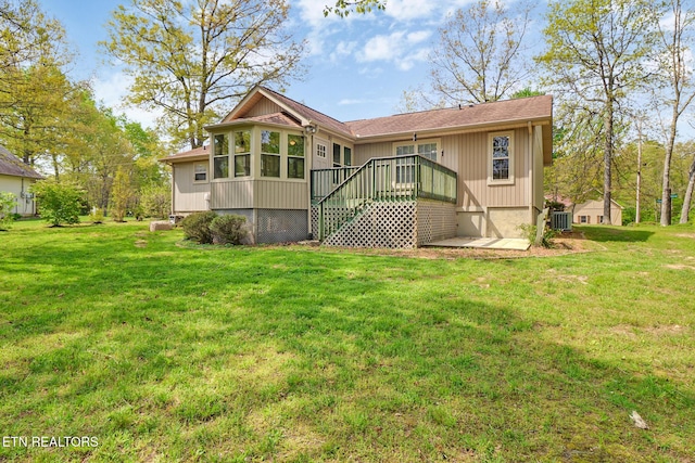 11 Windsor Pt, Crossville, TN 38558 - back of property featuring a lawn, a wooden deck, and central air condition unit