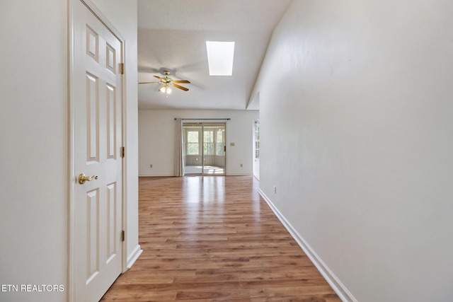 11 Windsor Pt, Crossville, TN 38558 - corridor with light wood-style floors, baseboards, and a skylight