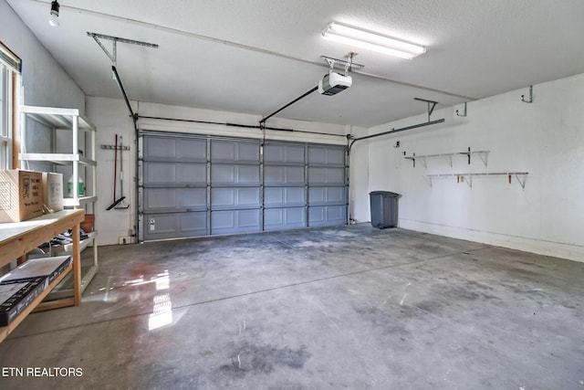 11 Windsor Pt, Crossville, TN 38558 - garage featuring a garage door opener
