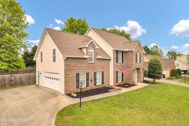 view of front of house featuring fence, a garage, a front lawn, and driveway
