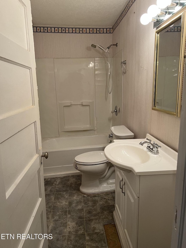 922 W Central Ave, Lafollette, TN 37766 - full bath featuring vanity, a textured ceiling, tub / shower combination, and toilet