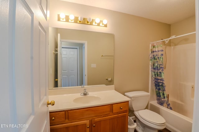 full bathroom featuring shower / tub combo, toilet, and vanity