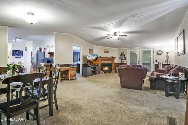 119 Sunset View Dr, Kingston, TN 37763 - carpeted dining area with a ceiling fan, lofted ceiling, french doors, and a lit fireplace