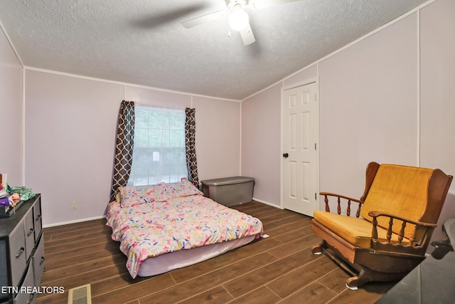 119 Sunset View Dr, Kingston, TN 37763 - bedroom featuring dark wood finished floors, a textured ceiling, ornamental molding, ceiling fan, and baseboards