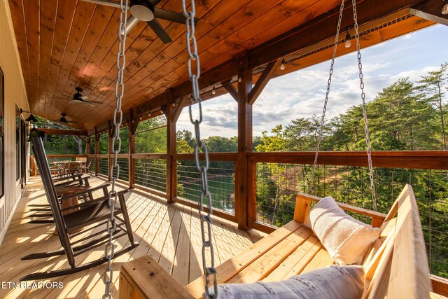 790 Pleasure Rd, Sevierville, TN 37876 - wooden deck with outdoor dining space and ceiling fan