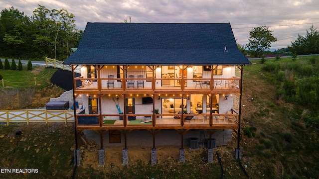 790 Pleasure Rd, Sevierville, TN 37876 - rear view of property with central AC, a balcony, a deck, a shingled roof, and fence