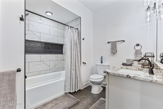 790 Pleasure Rd, Sevierville, TN 37876 - full bath with wood finished floors, vanity, shower / bathtub combination with curtain, baseboards, and toilet