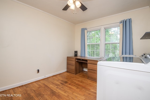 office area with ornamental molding, washer / dryer, baseboards, ceiling fan, and light wood-style flooring