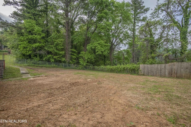 view of yard featuring fence