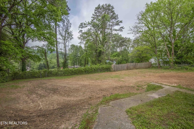 view of yard with fence