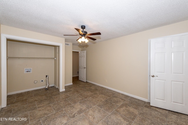 unfurnished bedroom featuring ceiling fan, a textured ceiling, visible vents, baseboards, and a closet