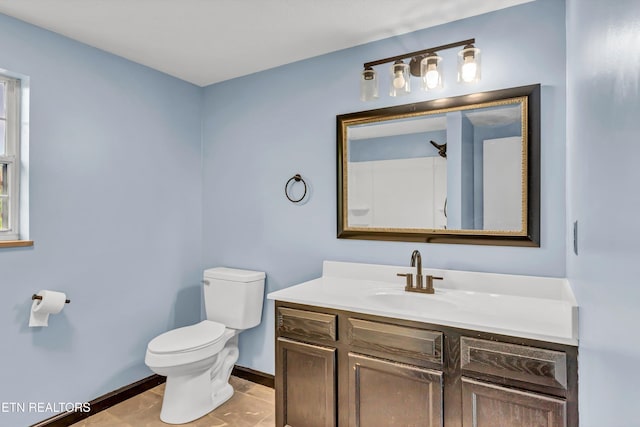 1921 Spring Hill Rd, Knoxville, TN 37914 - bathroom featuring toilet, vanity, and baseboards