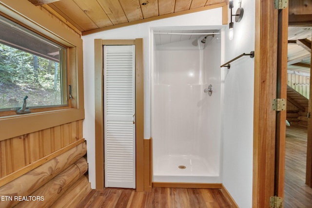4360 Lakeshore Ave, Sevierville, TN 37876 - full bathroom featuring vaulted ceiling, wood ceiling, a shower stall, and wood finished floors