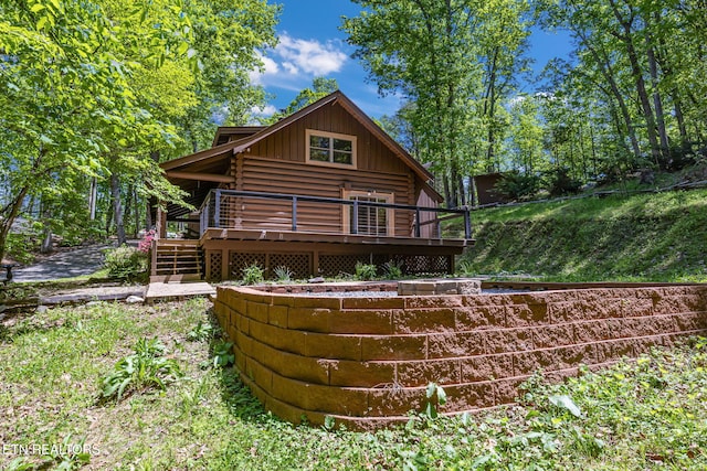 4360 Lakeshore Ave, Sevierville, TN 37876 - back of property featuring log exterior, a wooden deck, and board and batten siding