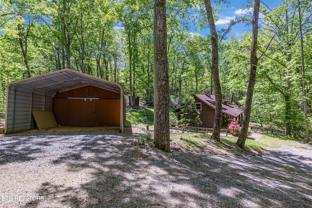 4360 Lakeshore Ave, Sevierville, TN 37876 - exterior space with a detached carport and driveway