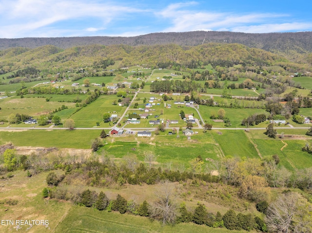 birds eye view of property featuring a rural view