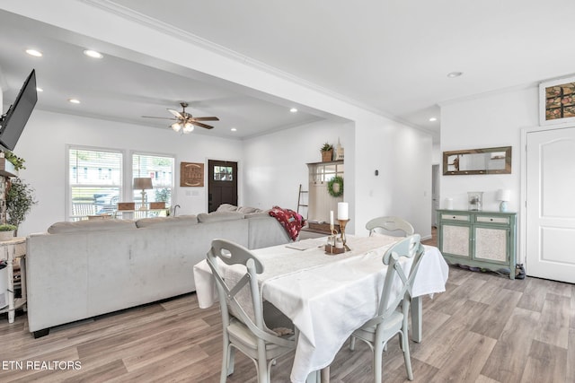 dining area featuring ceiling fan, recessed lighting, crown molding, and light wood-style flooring