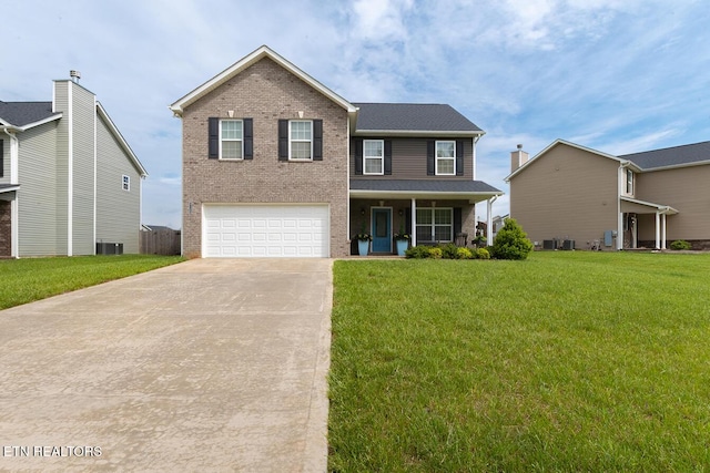 view of front of property with brick siding, a garage, cooling unit, a front yard, and concrete driveway