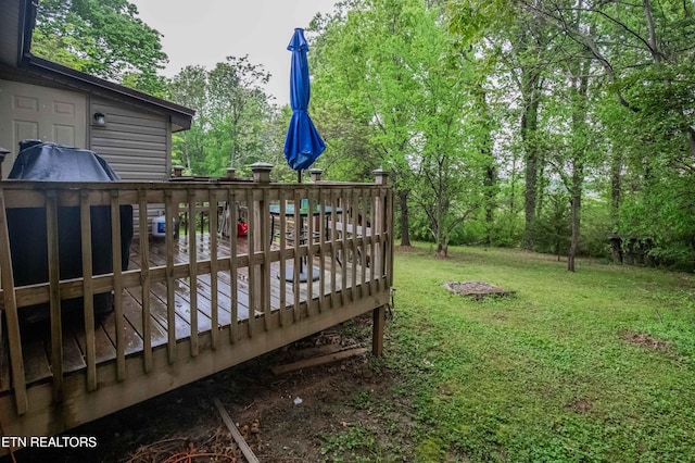 view of yard with a deck