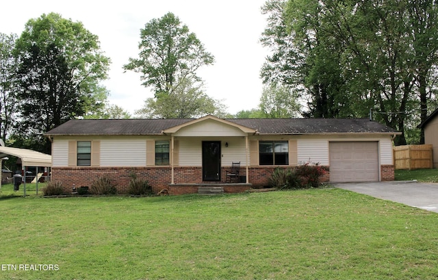 ranch-style home featuring covered porch, brick siding, and driveway