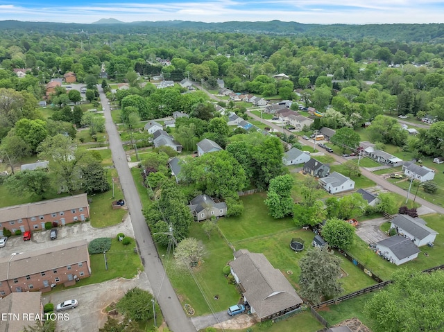 bird's eye view with a forest view and a residential view