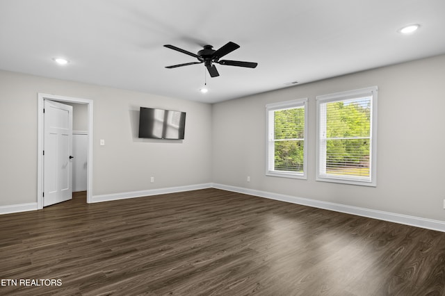 unfurnished room featuring visible vents, baseboards, dark wood-type flooring, recessed lighting, and a ceiling fan