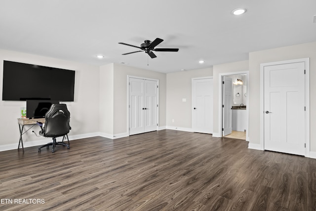 home office featuring baseboards, a ceiling fan, recessed lighting, and dark wood-type flooring