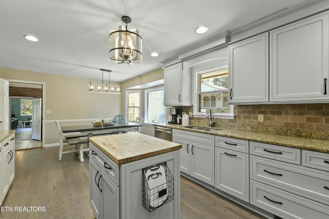1517 Deerfield Way, Lafollette, TN 37766 - kitchen with a sink, dark wood finished floors, recessed lighting, a notable chandelier, and wood counters