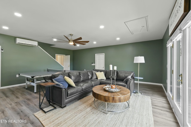 1517 Deerfield Way, Lafollette, TN 37766 - living area with a wall mounted air conditioner, baseboards, wood finished floors, and attic access