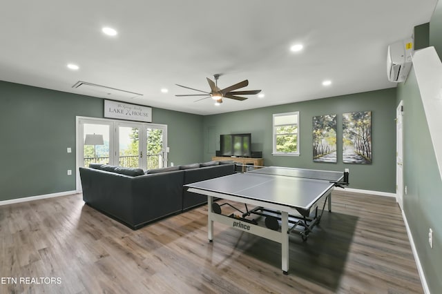 1517 Deerfield Way, Lafollette, TN 37766 - recreation room with a wall mounted air conditioner, wood finished floors, ceiling fan, baseboards, and recessed lighting
