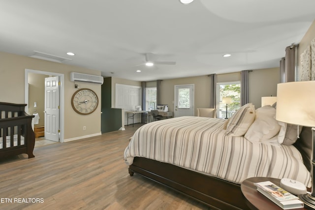 1517 Deerfield Way, Lafollette, TN 37766 - bedroom featuring recessed lighting, wood finished floors, a ceiling fan, a wall unit AC, and baseboards
