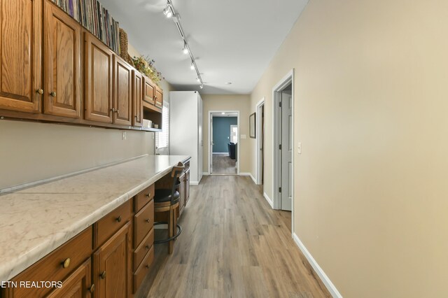 1517 Deerfield Way, Lafollette, TN 37766 - hall with baseboards, rail lighting, and light wood-style floors