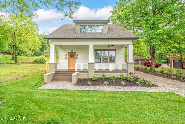 500 Barclay Dr, Knoxville, TN 37920 - view of front facade featuring covered porch, a shingled roof, and a front yard
