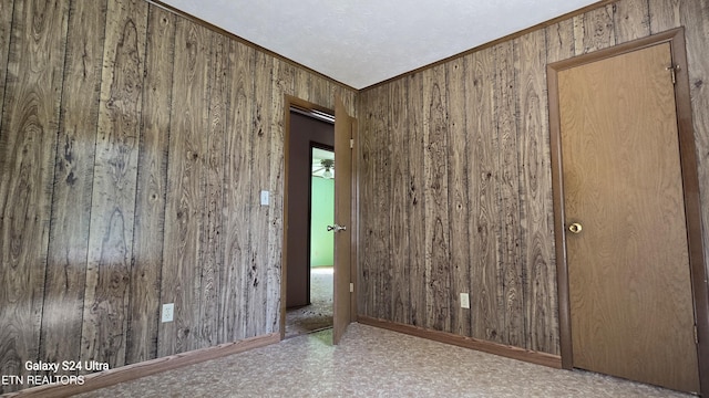 187 Briargate Ln, Greeneville, TN 37743 - unfurnished room featuring wooden walls and ornamental molding