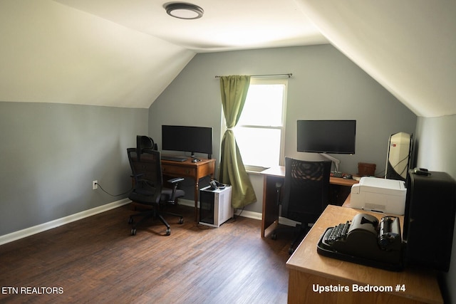 office space featuring baseboards, lofted ceiling, and dark wood-style floors