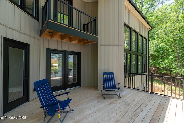 wooden deck with french doors