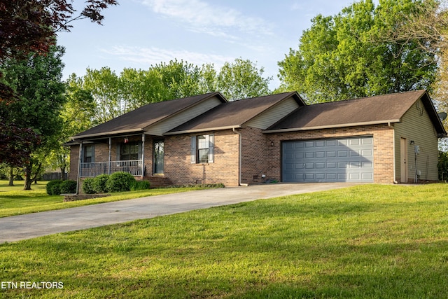 ranch-style home with a front lawn, concrete driveway, brick siding, and a garage