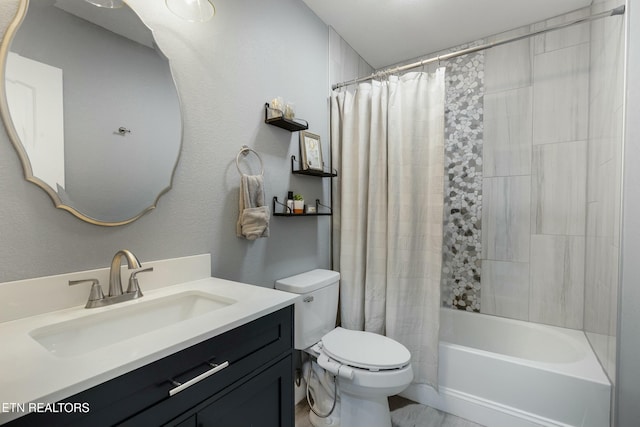 full bathroom featuring vanity, toilet, and shower / tub combo with curtain