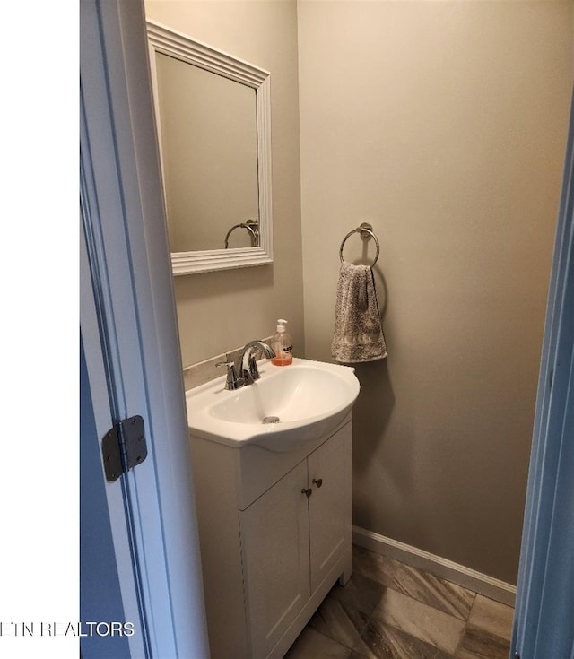 128 Waverly, Talbott, TN 37877 - bathroom with baseboards and vanity