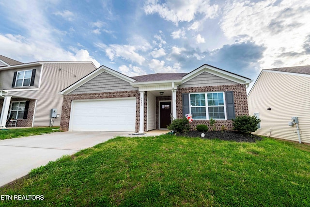 view of front facade with brick siding, a garage, driveway, and a front yard