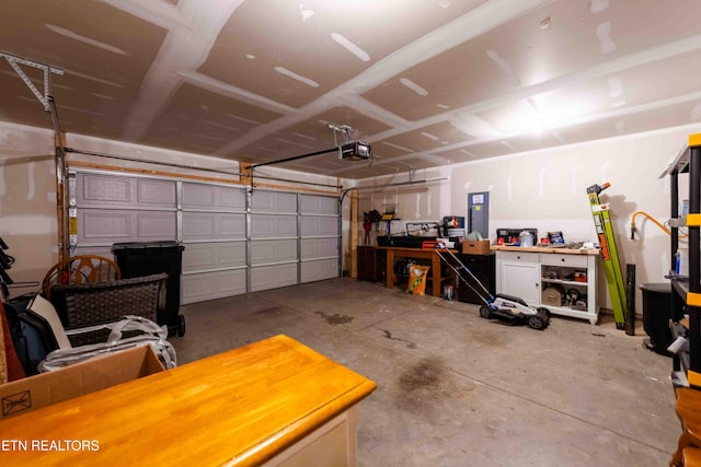 garage featuring a garage door opener