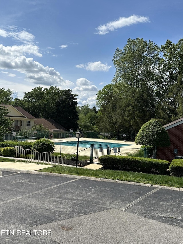 pool featuring fence