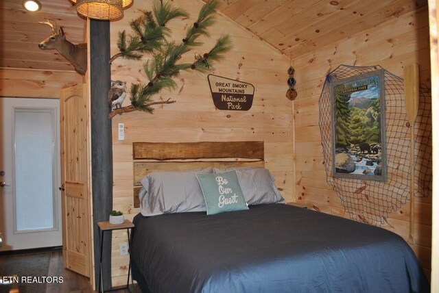 750 Caney Creek Rd, Cosby, TN 37722 - bedroom featuring wood ceiling, wooden walls, wood finished floors, and lofted ceiling