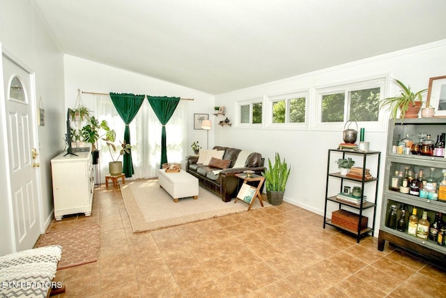 1340 Sumac Dr, Knoxville, TN 37919 - living room featuring vaulted ceiling and baseboards