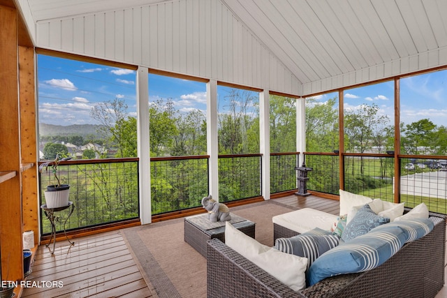 sunroom featuring an outdoor living space and plenty of natural light