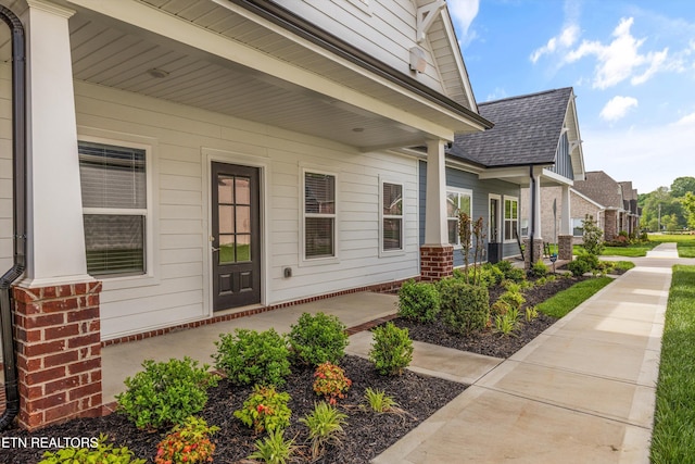 175 Goldheart Rd, Knoxville, TN 37934 - view of exterior entry with a shingled roof and brick siding