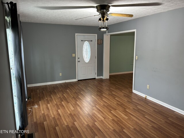 131 Oak Hill Dr, Jamestown, TN 38556 - entryway featuring a textured ceiling, ceiling fan, wood finished floors, and baseboards